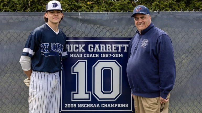 Former St. Dominic baseball coach Rick Garrett and his son,...