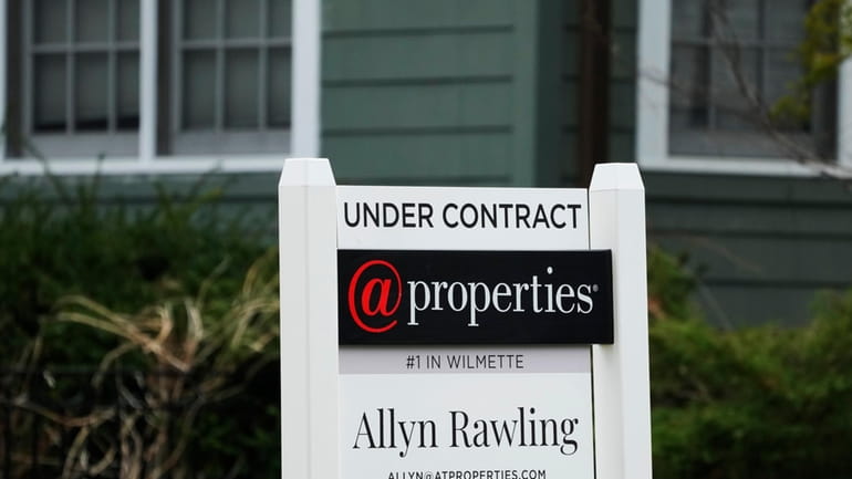 An "Under Contract" sign is displayed at a home in...