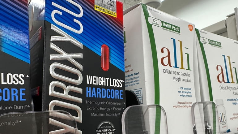 Dietary supplements are displayed at a store in New York,...