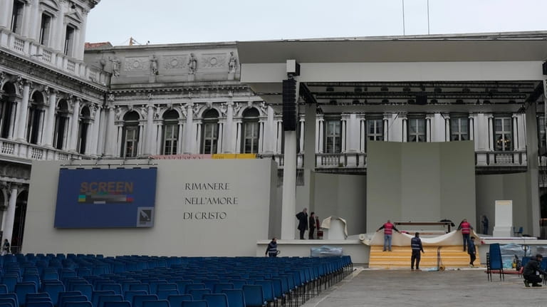 Workers make the final preparations ahead of Pope Francis' visit...