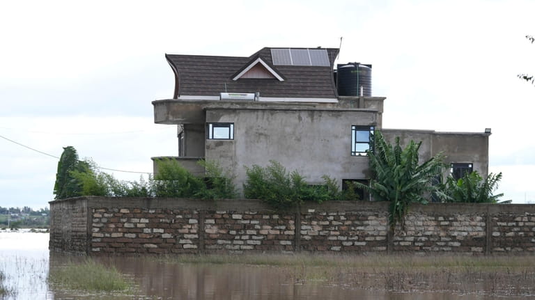 A partially submerged house is seen in Machakos county, Kenya...