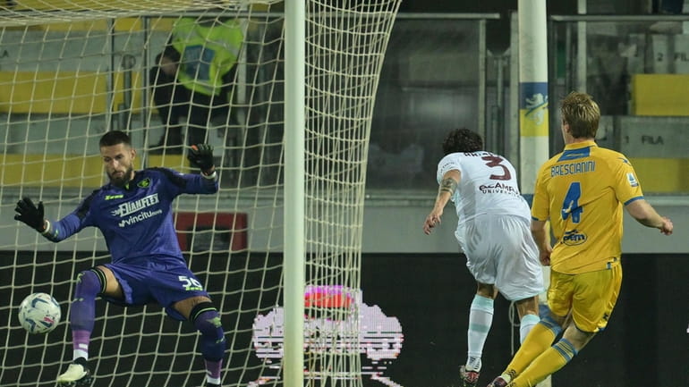 Frosinone's Marco Brescianini, right, scores during the Serie A soccer...