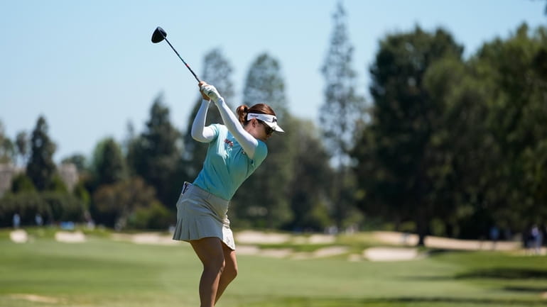 Hannah Green hits from the second tee during the third...