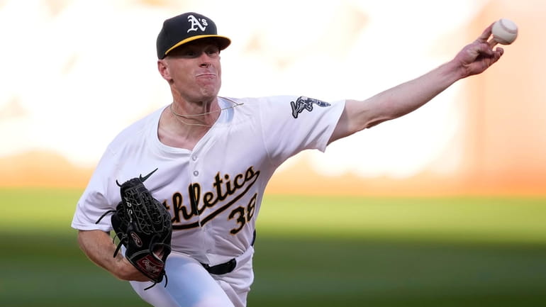 Oakland Athletics pitcher JP Sears works against the St. Louis...