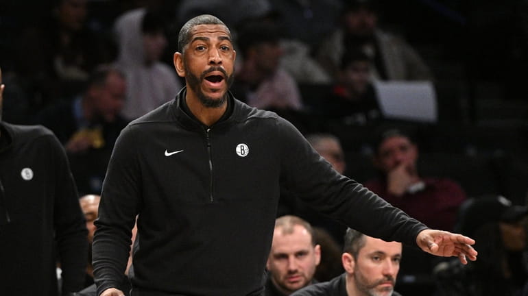 Nets interim head coach Kevin Ollie gestures in the first...