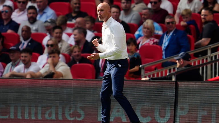 Manchester United's head coach Erik ten Hag reacts during the...