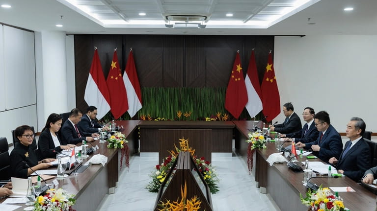 Indonesian Foreign Minister Retno Marsudi, left, speaks during their bilateral...