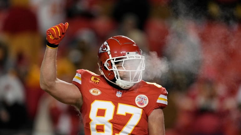 Kansas City Chiefs tight end Travis Kelce (87) warms up...