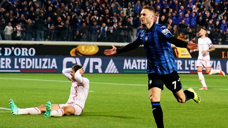 Atalanta's Teun Koopmeiners celebrates after scoring a goal during the...