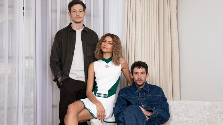 Mike Faist, from left, Zendaya and Josh O'Connor pose for...