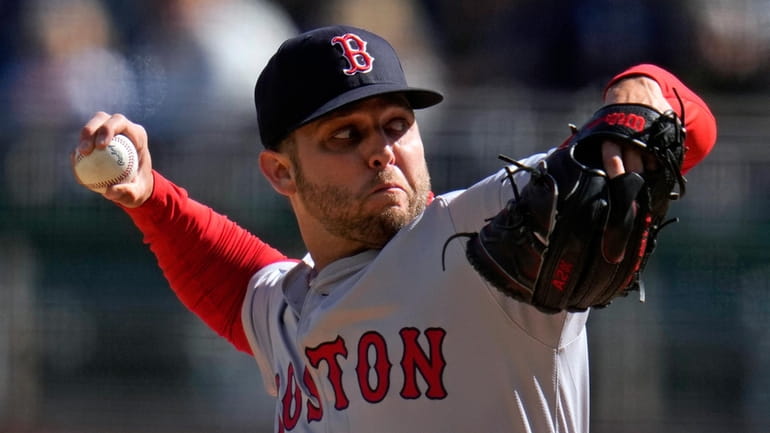 Boston Red Sox starting pitcher Kutter Crawford delivers during the...