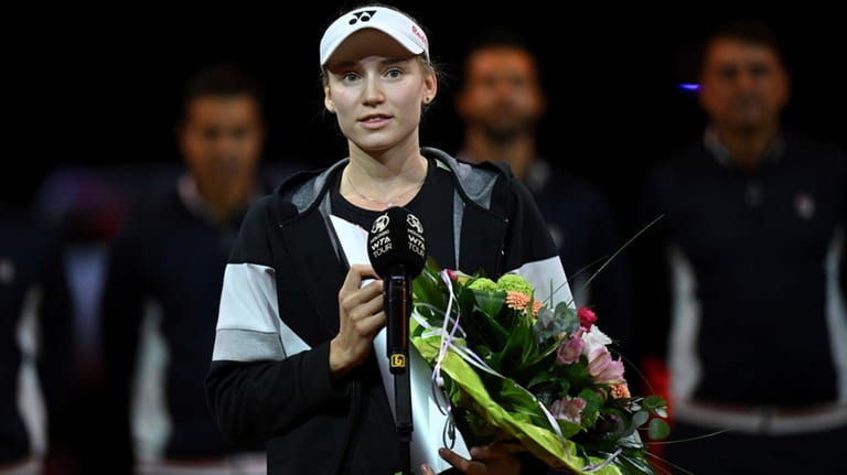 Kazakhstan's Elena Rybakina speaks after winning the Women Singles tennis...