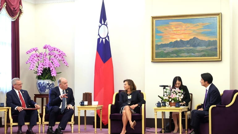 In this photo released by the Taiwan Presidential Office, from...