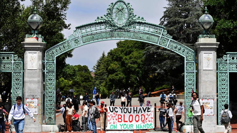Pro-Palestinians protesters protest in front of Sather Gate during a...