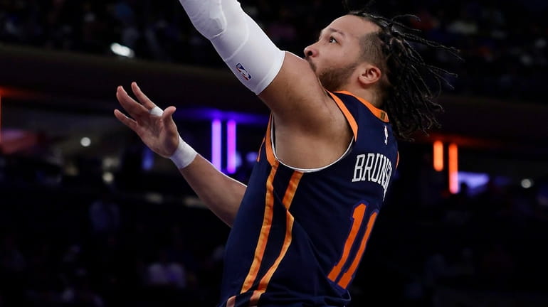 Jalen Brunson of the Knicks lays up a basket during the...