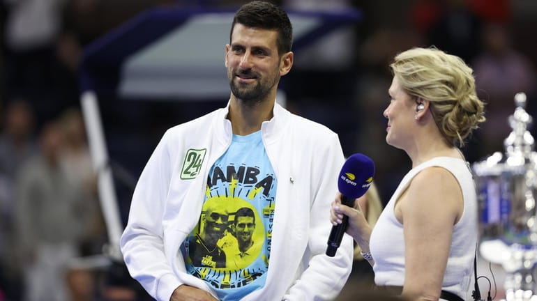 Champion Novak Djokovic is interviewed following his victory against Daniil Medvedev...