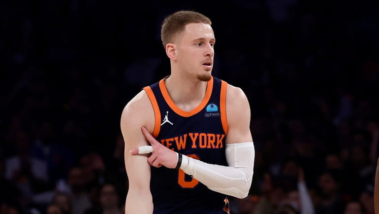 Donte DiVincenzo #0 of the Knicks reacts after a three...