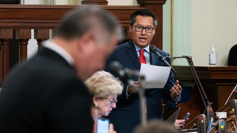 Assemblyman Vince Fong, R-Bakersfield, right, speaks at the Capitol in...
