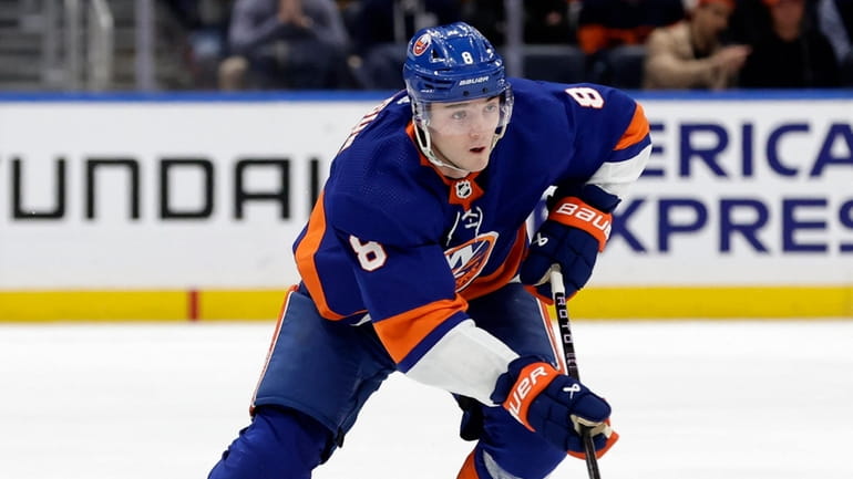 Noah Dobson #8 of the New York Islanders skates against...