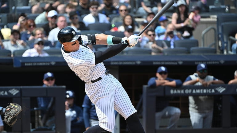 New York Yankees’ Aaron Judge strikes out swinging to end...