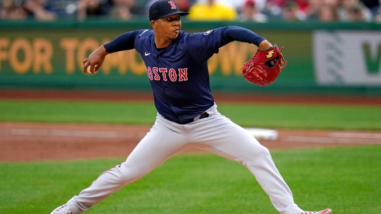 Boston Red Sox pitcher Brayan Bello delivers during the first...