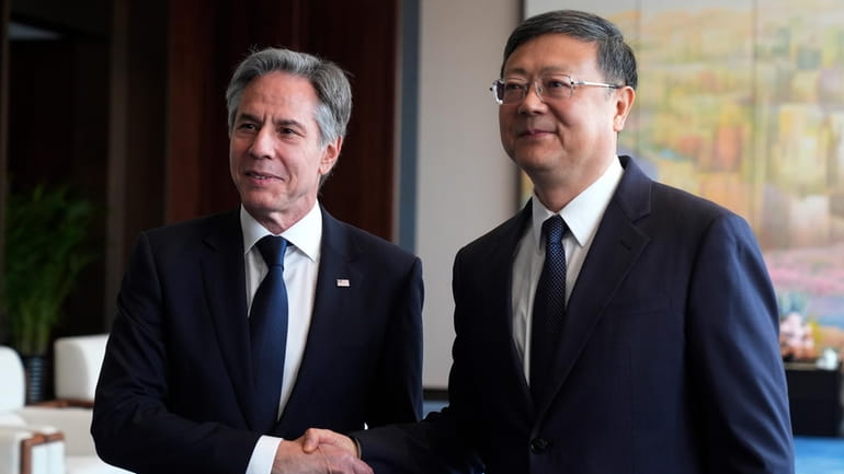 U.S. Secretary of State Antony Blinken, left, meets with Shanghai...