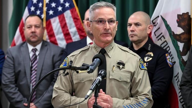 Tulare County Sheriff Mike Boudreaux speaks during a news conference...