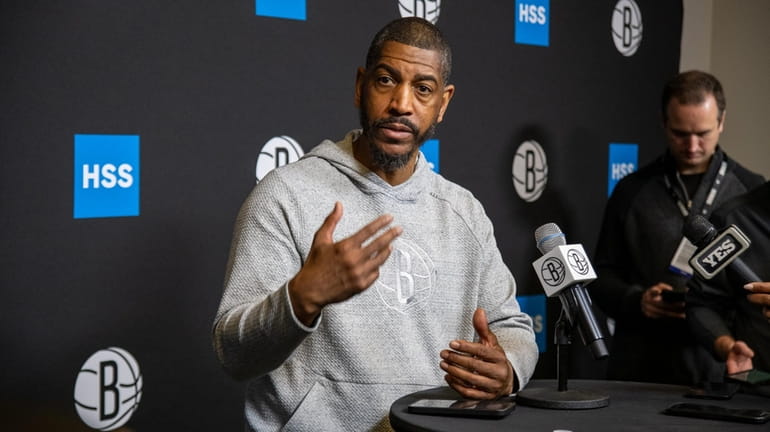 Interim Nets coach Kevin Ollie speaks after practice on Tuesday in...
