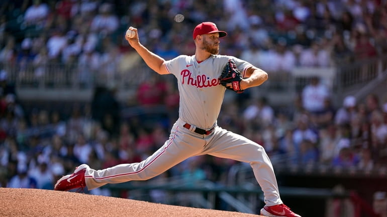 Philadelphia Phillies starting pitcher Zack Wheeler (45) delivers in the...