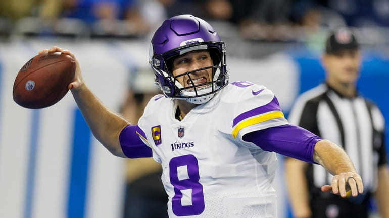 Minnesota Vikings' Kirk Cousins throws during the first half of...