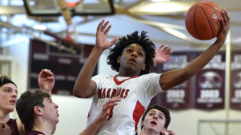 Armoni Zeigler of Amityville drives to the net during the Suffolk...