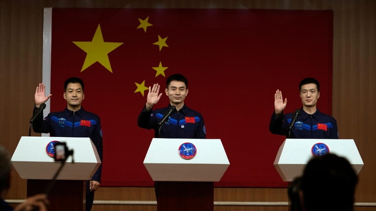 Chinese astronauts for the upcoming Shenzhou-18 mission, from left, Li...
