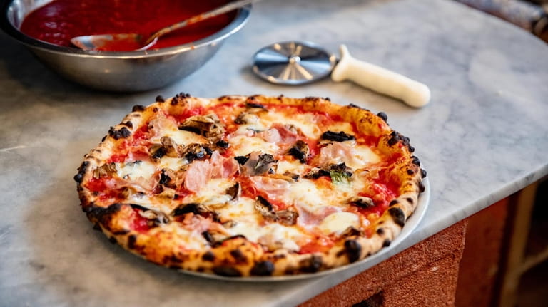 The proscutto e funghi pizza at Chef Gigi’s Place in...