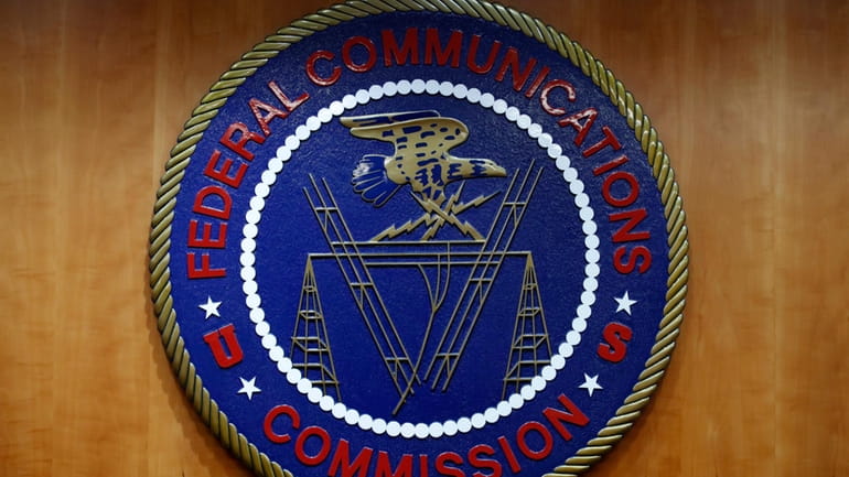 The seal of the Federal Communications Commission (FCC) is seen...