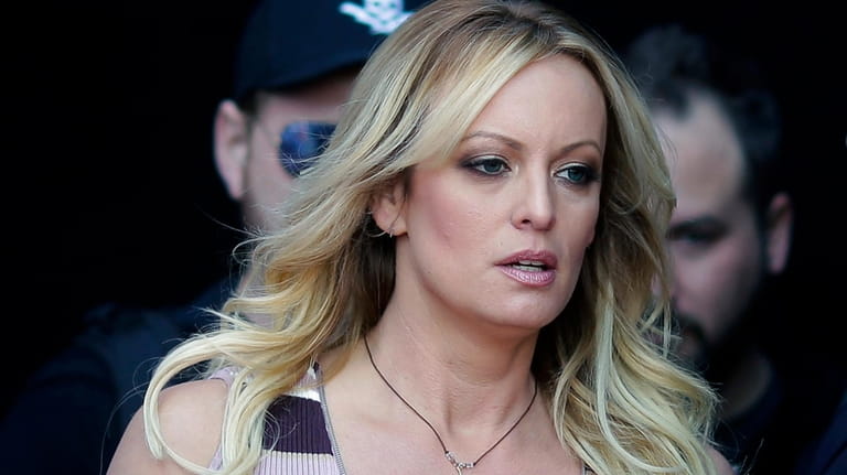 Adult film actress Stormy Daniels arrives at the adult entertainment...