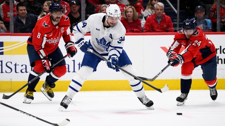 Toronto Maple Leafs center Auston Matthews (34) skates with the...