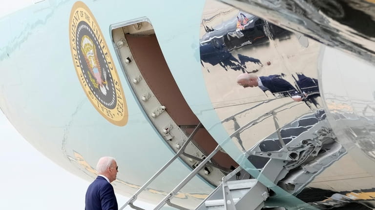 President Joe Biden boards Air Force One at Dallas Fort...
