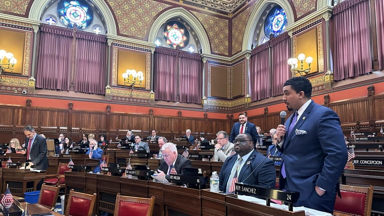 Connecticut state Rep. Manny Sanchez debates a bill in the...