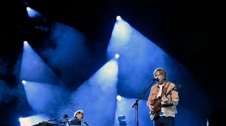Keyboardist Page McConnell, left, and Trey Anastasio, guitarist and singer-songwriter...