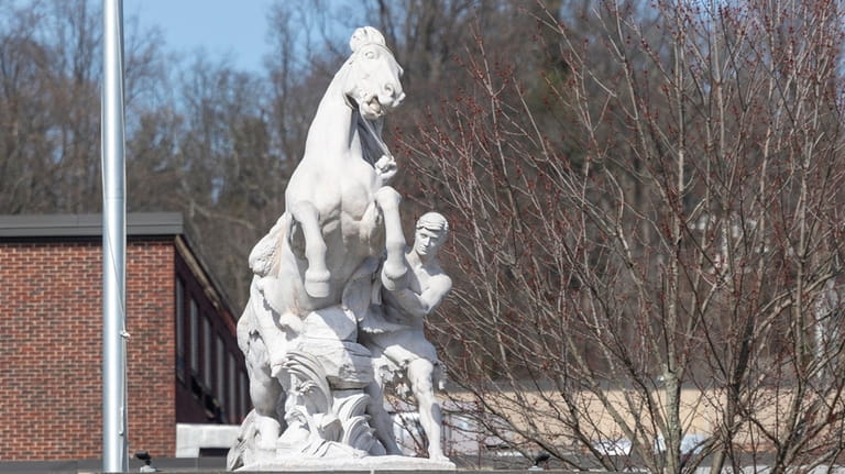 The fully restored horse tamer statue at Roslyn High School.