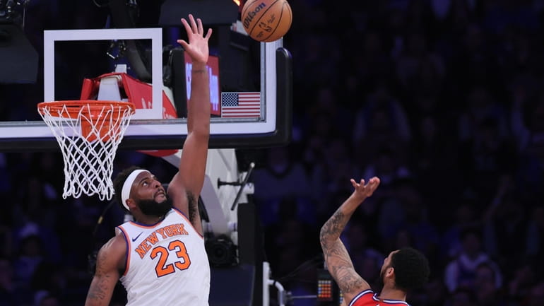 New York Knicks center Mitchell Robinson (23) blocks Philadelphia 76ers...