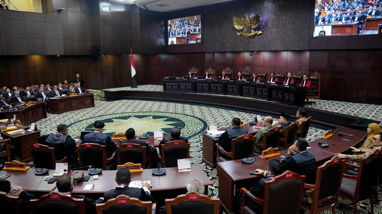 Judges preside over the election appeal hearing at the Constitutional...
