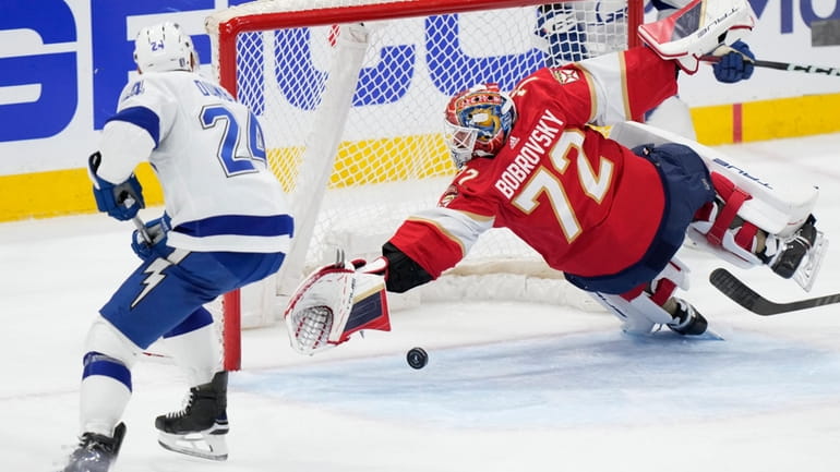 Florida Panthers goaltender Sergei Bobrovsky (72) blocks a shot by...