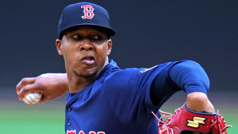 Boston Red Sox pitcher Brayan Bello delivers during the first...