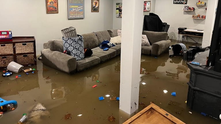 Ryan Schneider's basement after a September flood. He says he...