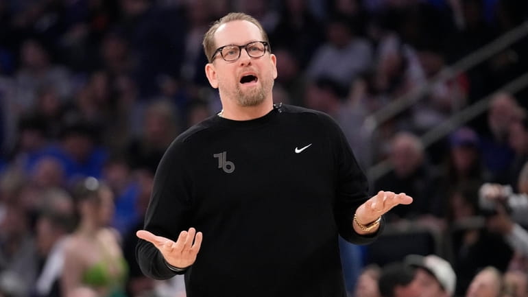 Philadelphia 76ers head coach Nick Nurse reacts during the first...