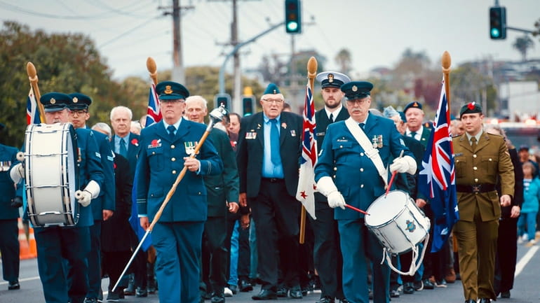 Veterans march during a Anzac Day parade at Hobsonville near...