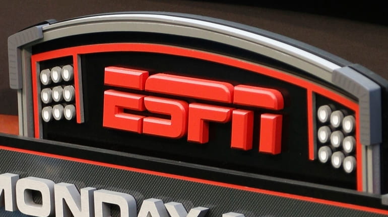 This Sept. 16, 2013, file photo shows the ESPN logo...