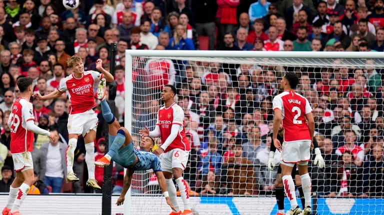 Aston Villa's Diego Carlos trie an overhead kick during the...
