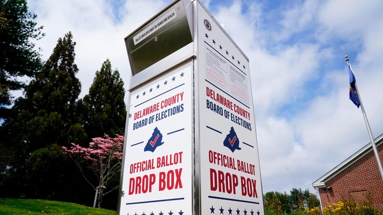 A Delaware County secured drop box for the return of...